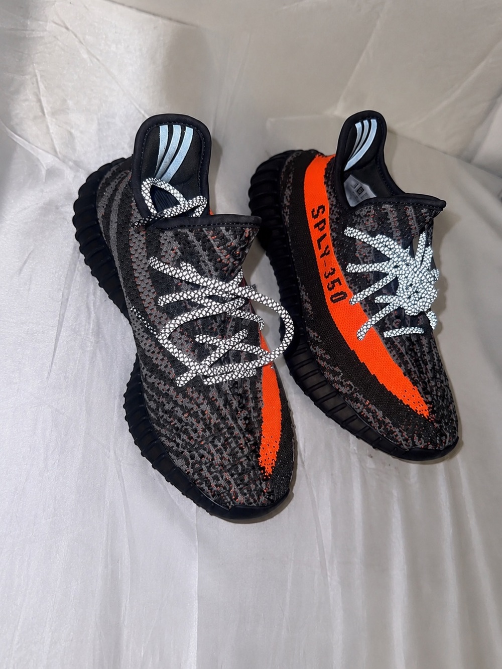 Yeezy Boost 350 V2 Black with Orange Stripe and Reflective Laces